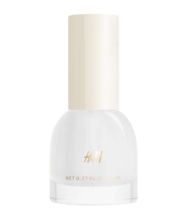 Eine Flasche Nagellack der Marke H&M in einer hellen Farbe.