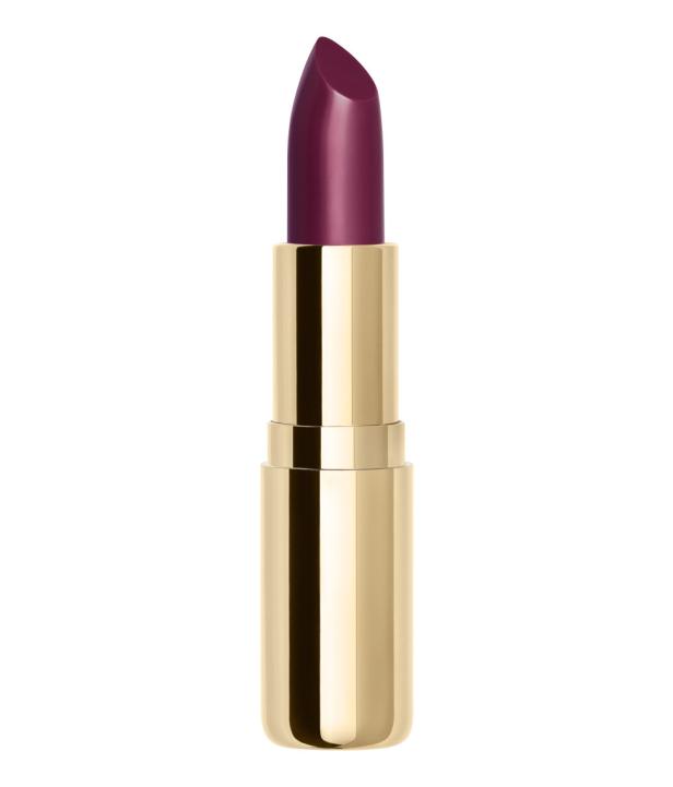 Ein geöffneter Lippenstift mit goldener Hülle und dunkelroter Farbe.