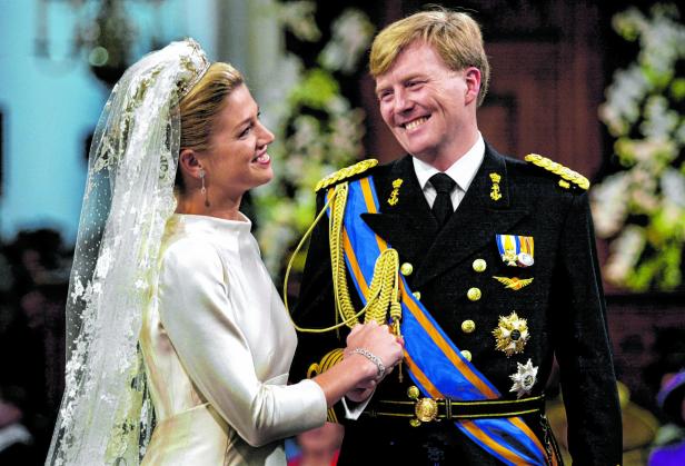 FILE PHOTO: Princess Maxima smiles broadly at Dutch Crown Prince Willem-Alexander during their wedding cerem..