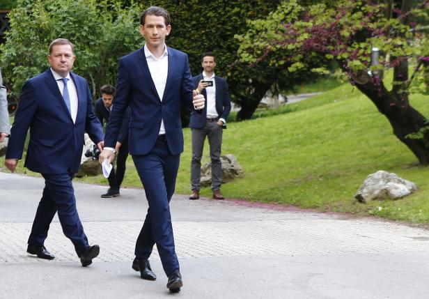 Austria's Foreign Minister and designated new leader of the OeVP Kurz and OeVP Secretary General Amon are on their way to a news conference in Vienna, Austria, May 14, 2017.