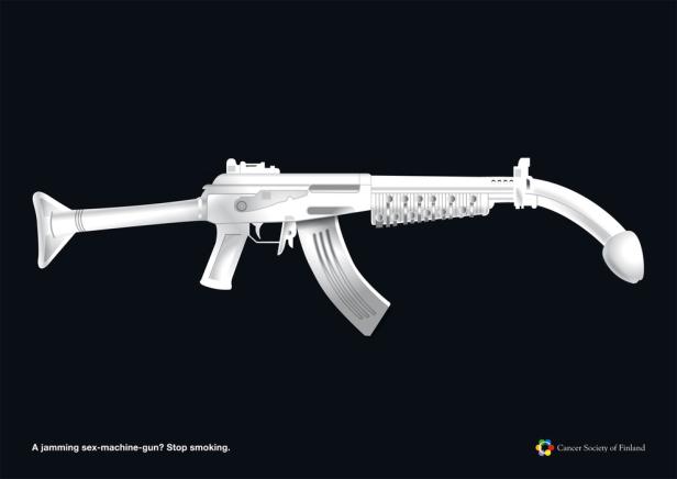 Eine stilisierte Waffe mit einem Dildo anstelle des Laufes vor einem schwarzen Hintergrund.