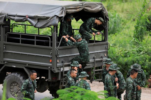 Soldiers arrive at Tham Luang cave complex in the northern province of Chiang Rai