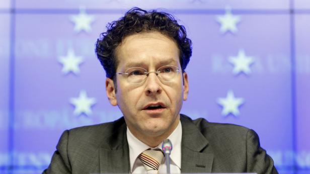 Eurogruppenchef Dijsselbloem Jeroen Dijsselbloem spricht vor einem Hintergrund mit EU-Sternen.
