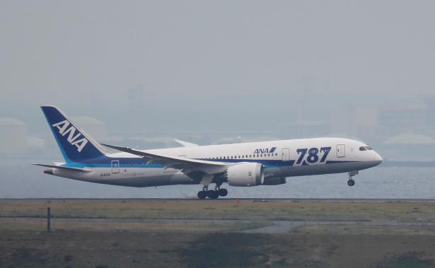An ANA Boeing Co's 787 Dreamliner plane, which flew from Sapporo, lands at Haneda airport in Tokyo