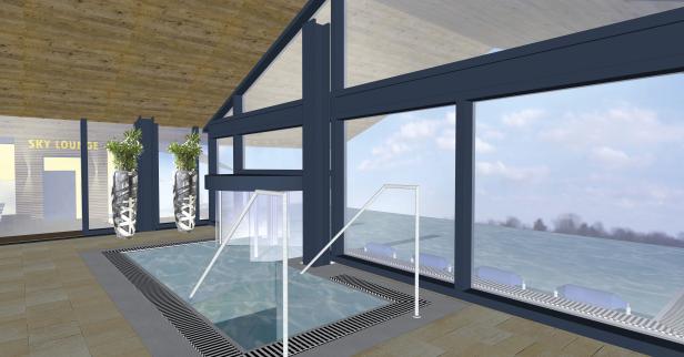 Innenansicht eines Schwimmbads mit großen Fenstern und Blick auf eine Landschaft.