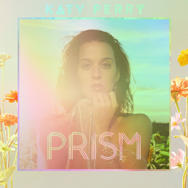 Das Album „Prism“ von Katy Perry mit einem Porträt der Sängerin vor Blumen und Himmel.