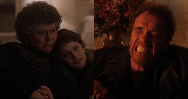 Eine Frau tröstet eine andere, während ein Mann vor Schmerz das Gesicht verzieht.