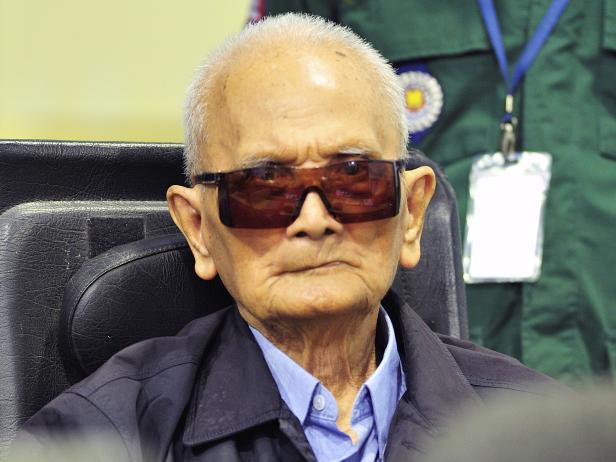 Former Khmer Rouge leader ''Brother Number Two'' Nuon Chea sits inside the courtroom of the Extraordinary Chambers in the Courts of Cambodia (ECCC) as he awaits a verdict, on the outskirts of Phnom Penh