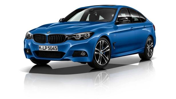 Ein blaues BMW 3er Gran Turismo Modell steht auf einem weißen Hintergrund.