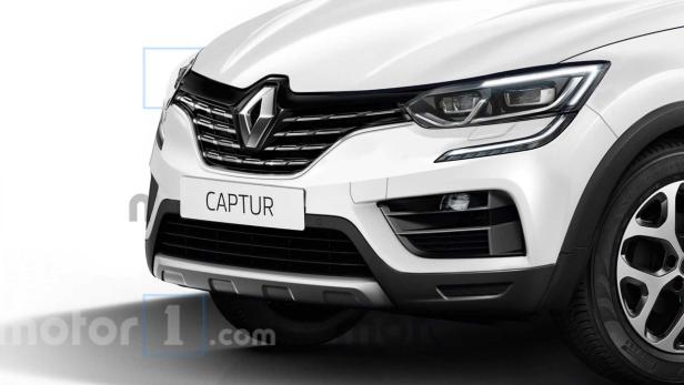 Detailansicht der Frontpartie eines weißen Renault Captur.