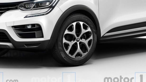 Detailansicht eines weißen Renault Captur mit Fokus auf Scheinwerfer und Rad.