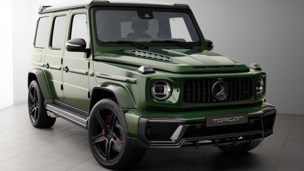 Ein grüner Mercedes-Benz G-Klasse Geländewagen von vorne.