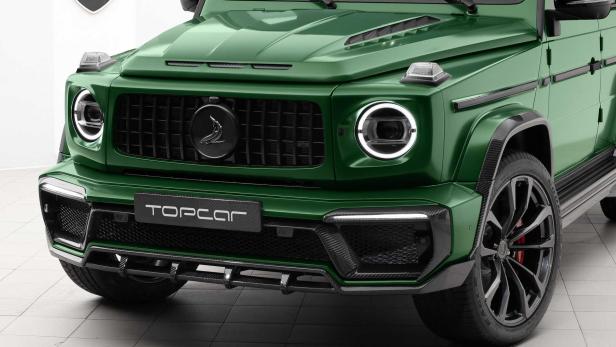 Nahaufnahme der Frontpartie eines grünen Topcar-Mercedes-Benz G-Klasse-SUV.