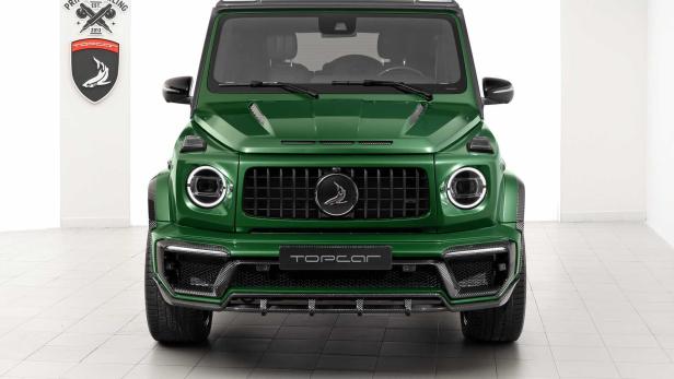 Ein grüner Mercedes-Benz G-Klasse mit Topcar-Tuning von vorne.