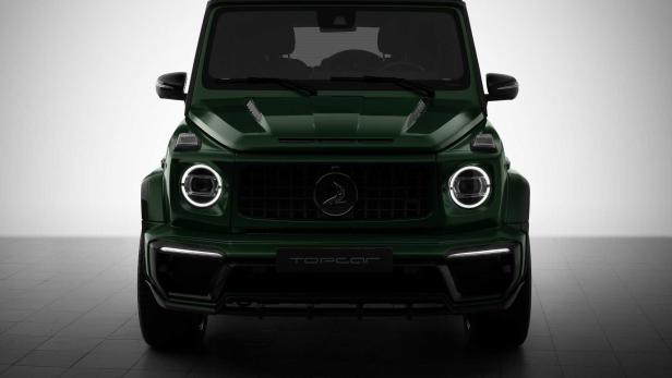 Ein grüner Mercedes-Benz G-Klasse Geländewagen, Frontansicht.