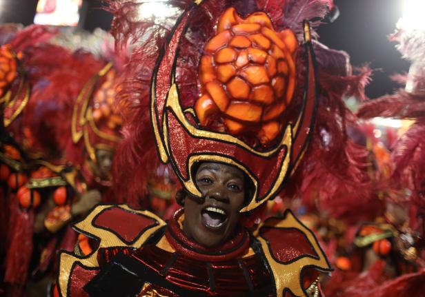 A reveller from Salgueiro samba school performs during the first night of the Carnival parade in Rio de Janeiro