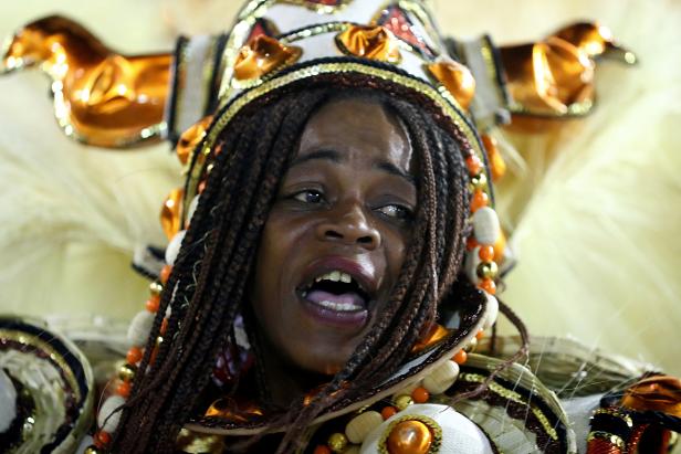 A reveller from Salgueiro samba school performs during the first night of the Carnival parade in Rio de Janeiro