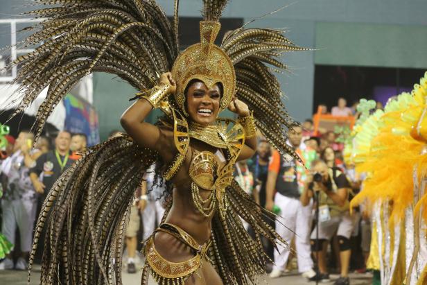 A reveller from Grande Rio Samba school performs during the first night of the Carnival parade at the Sambadrome in Rio de Janeiro