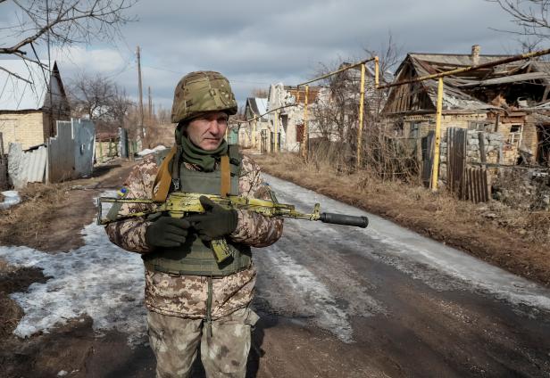 Ukrainian serviceman is seen at the front line in the village of Zaitseve