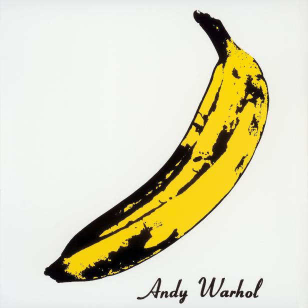 Eine stilisierte gelbe Banane mit schwarzen Akzenten, signiert von Andy Warhol.