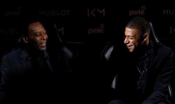 French soccer player Kylian Mbappe and soccer Brazilian legend Pele meet in Paris