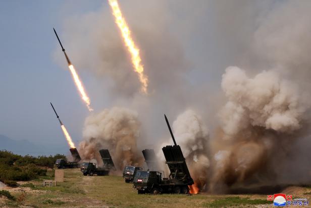 North Korean military conducts a "strike drill" for multiple launchers and tactical guided weapon into the East Sea during a military drill in North Korea