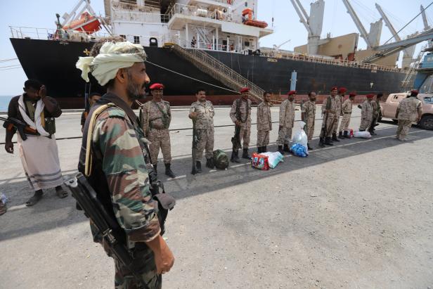 Yemen's Houthi movement forces are seen during withdrawal from Saleef port in Hodeidah province