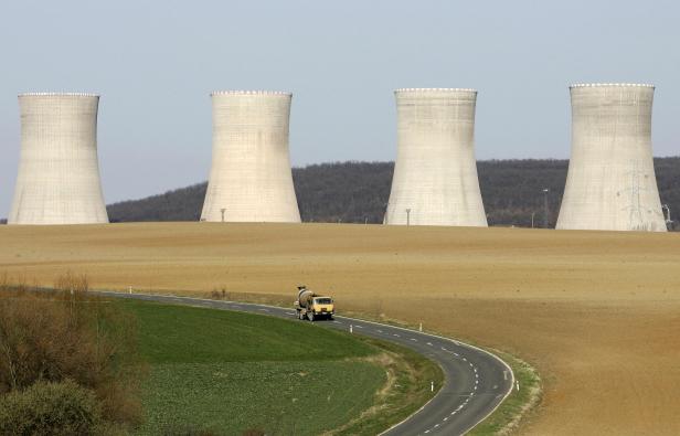 FILE PHOTO: A vehicle travels past the Mochovce Nuclear Power Plant cooling towers in Mochovce