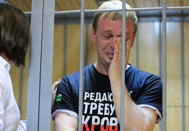 Russian investigative journalist Golunov attends a court hearing in Moscow