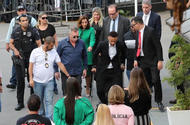 Brazilian soccer player Neymar arrives at a police station in Sao Paulo