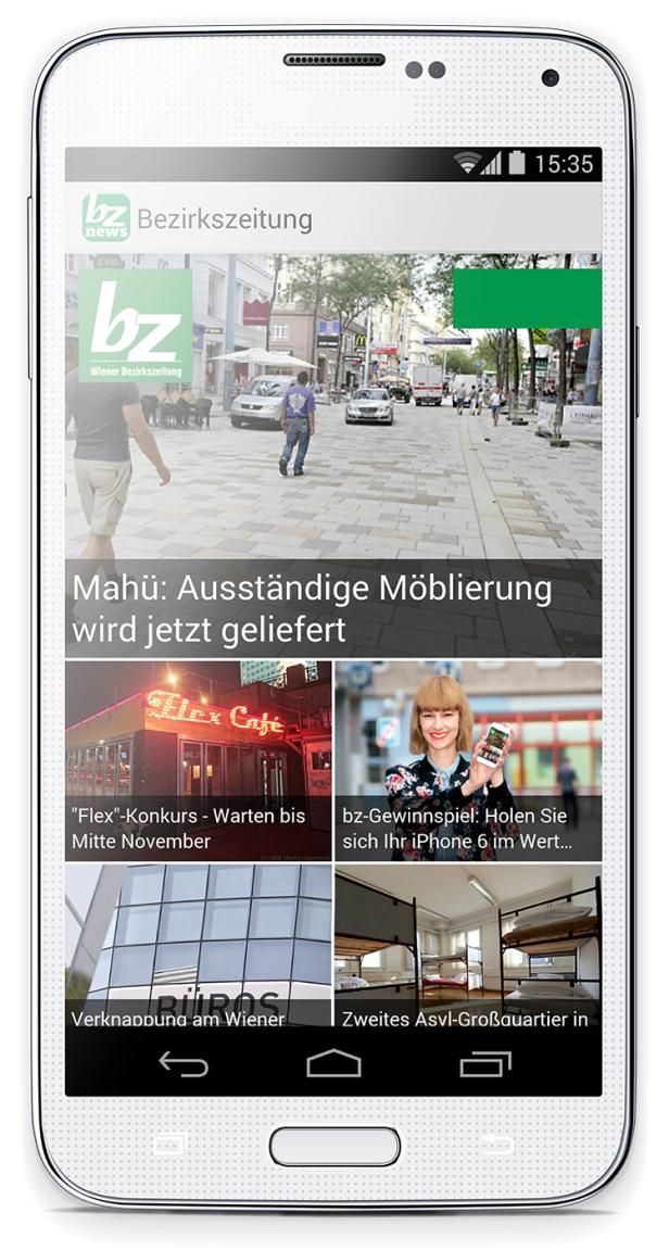 Ein Smartphone zeigt die Startseite der „Bezirkszeitung“.