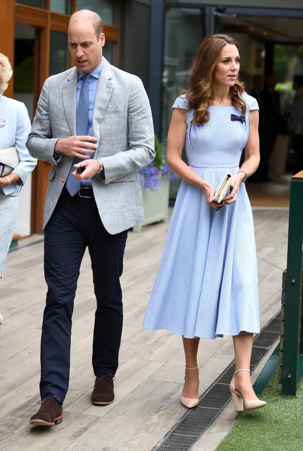 Prince William and Catherine, the Duchess of Cambridge, arrive for the Men's Final at the Wimbledon Championships at the All England Lawn Tennis and Croquet Club, in London