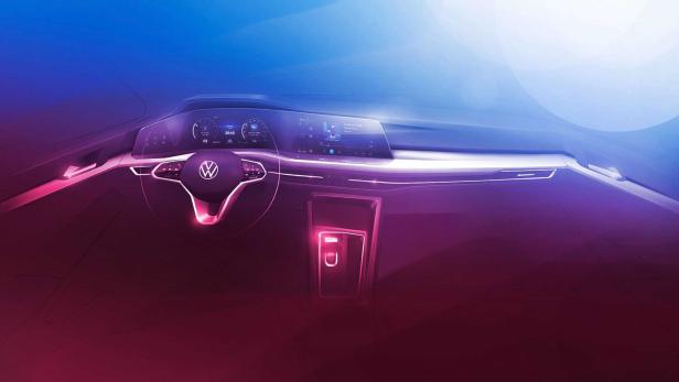 Das futuristische Interieur eines Volkswagen mit digitalem Cockpit und beleuchtetem Lenkrad.