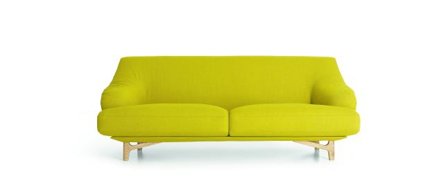 Ein hellgrünes Sofa mit Holzbeinen vor einem weißen Hintergrund.