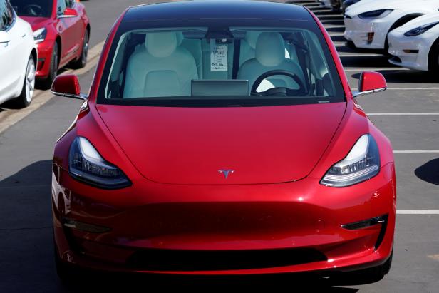 A new Tesla Model 3 is shown at a delivery center on the last day of the company's third quarter, in San Diego