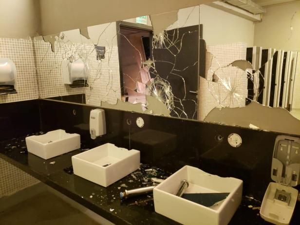 Damaged sinks and shattered mirrors are seen in a toilet vandalized by Cruzeiro fans at Mineirao stadium after Palmeiras defeated Cruzeiro in a soccer match, in Belo Horizonte