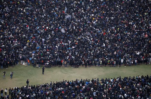 Anti-government protesters attend a demonstration on New Year's Day to call for better governance and democratic reforms in Hong Kong