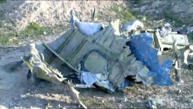 Part of the wreckage from Ukraine International Airlines flight PS752, a Boeing 737-800 plane that crashed after taking off from Tehran's Imam Khomeini airport