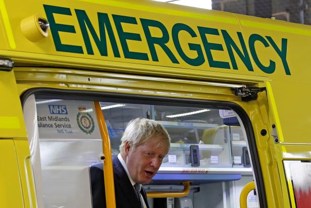 FILE PHOTO: Britain's Prime Minister Boris Johnson looks out from an ambulance during a visit to Pilgrim Hospital in Boston, Britain August 5, 2019.