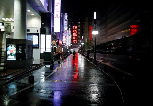 Almost empty street is seen after the government announced the state of emergency following the coronavirus disease outbreak at Kabukicho district in Tokyo