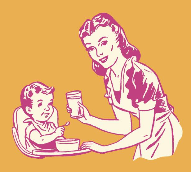 Woman Feeding Child