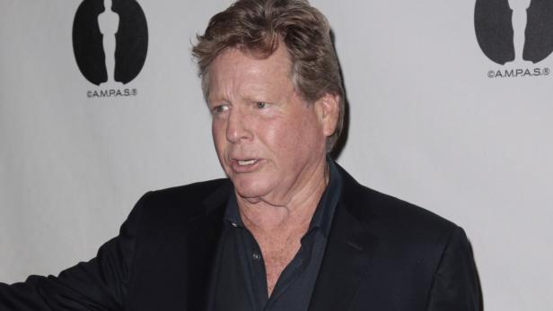 Porträt von Ron Howard vor einem Hintergrund mit dem Logo der Academy of Motion Picture Arts and Sciences.