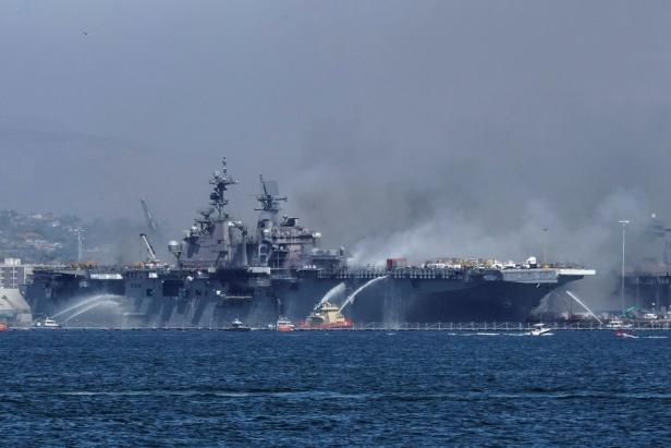Smoke rises from a fire on board the U.S. Navy amphibious assault ship USS Bonhomme Richard