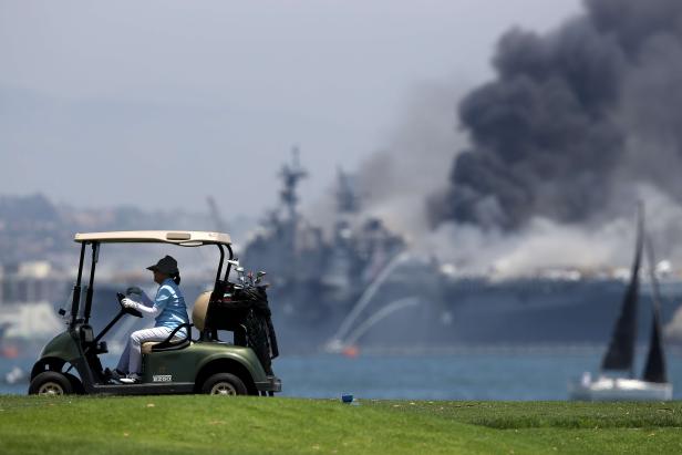 US-NAVY-SHIP-USS-BONHOMME-RICHARD-BURNS-AT-NAVAL-BASE-IN-SAN-DIE