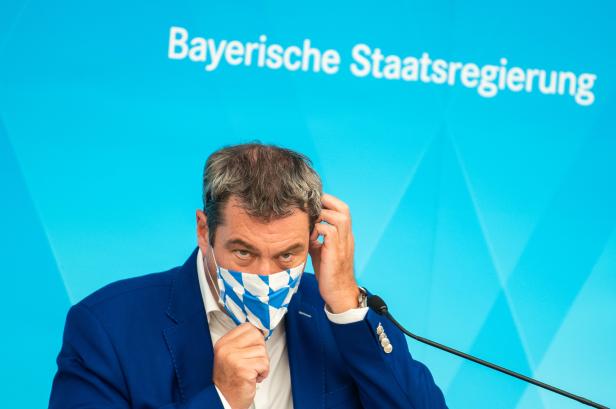 Bavarian State Prime Minister Markus Soeder attends a news conference in Nuremberg