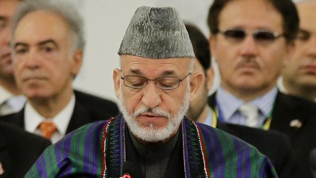 Präsident Karzai in Tokio: "Wirtschaft unterentwickelt" Hamid Karzai, ehemaliger Präsident von Afghanistan, bei einer Rede.