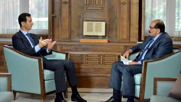 Syria's President Bashar al-Assad answers question