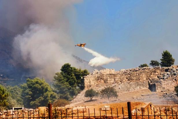 Bushfire burns near the archaeological site of Mycenae, Peloponese, Greece