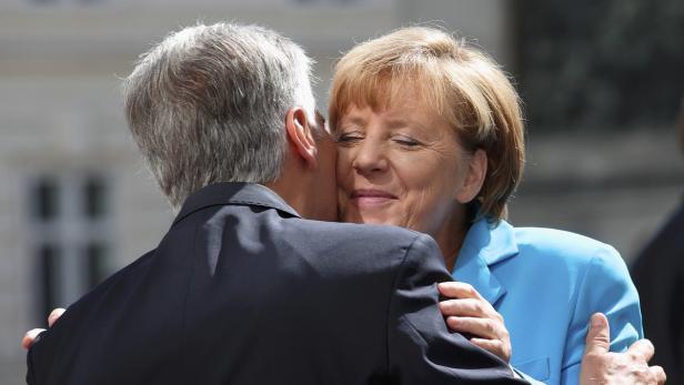 Faymann und Merkel: EU-Lösung forcieren