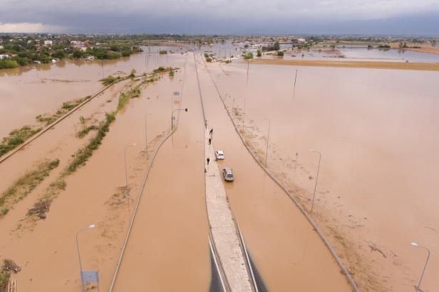 View of a flooded highway following a storm near the village of Artesiano